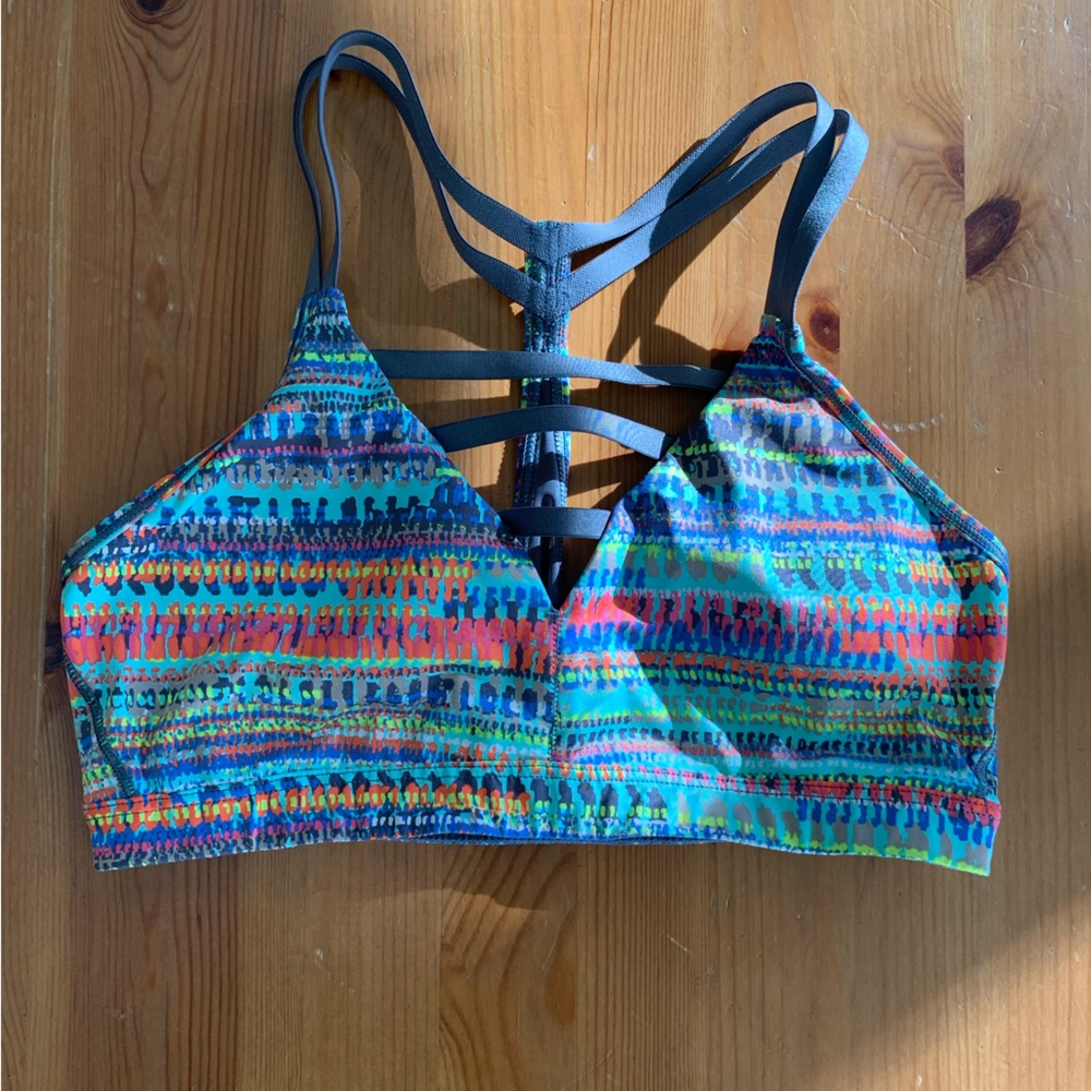 Super cute multicolored sports bra with strap detailing in the front